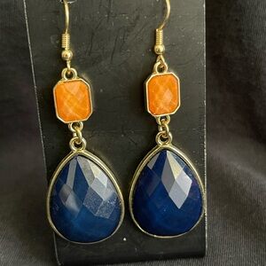 Gold tone earrings with faceted orange and blue beads
